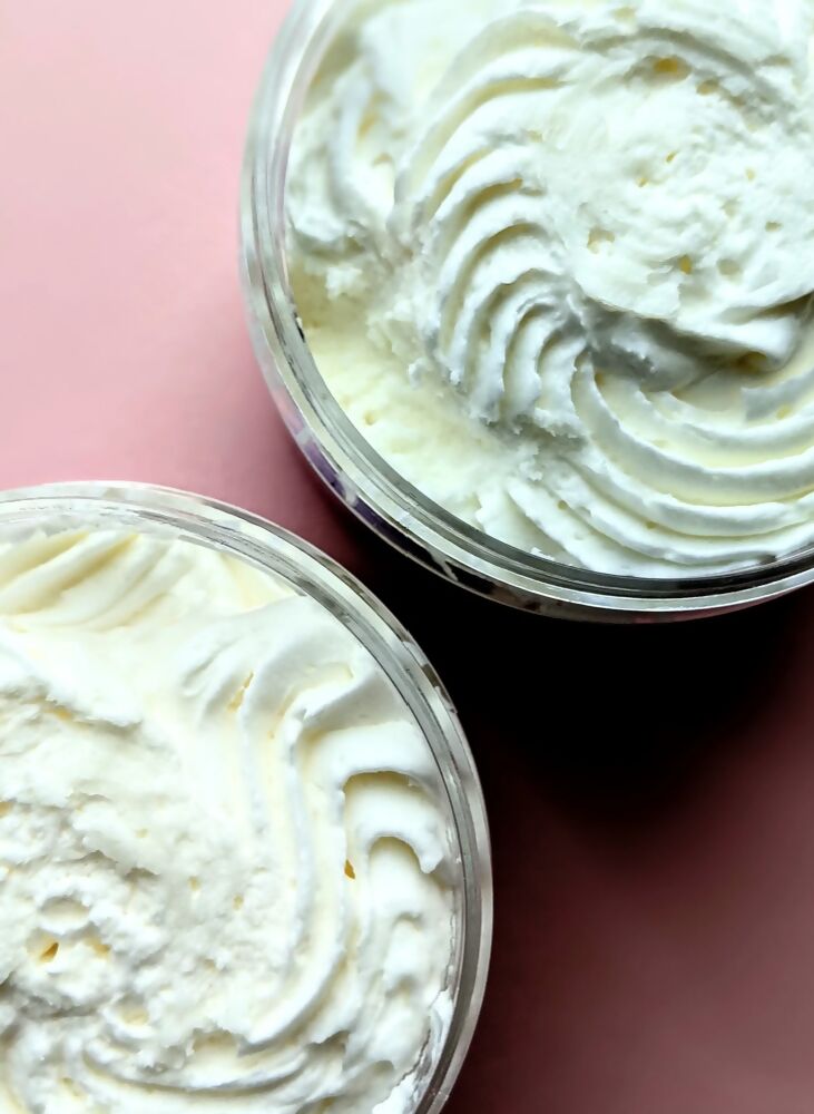 Two large open whipped body butters