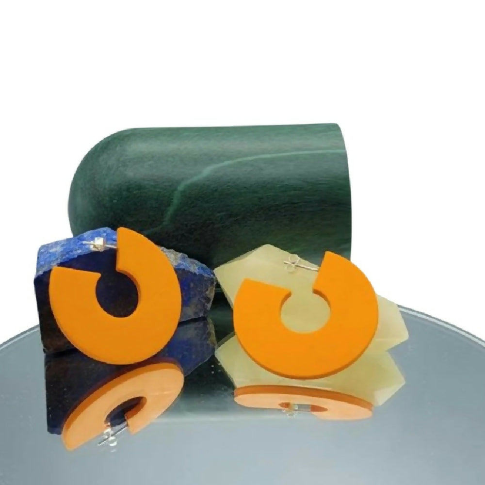 3D Printed Disk Earrings In Orange